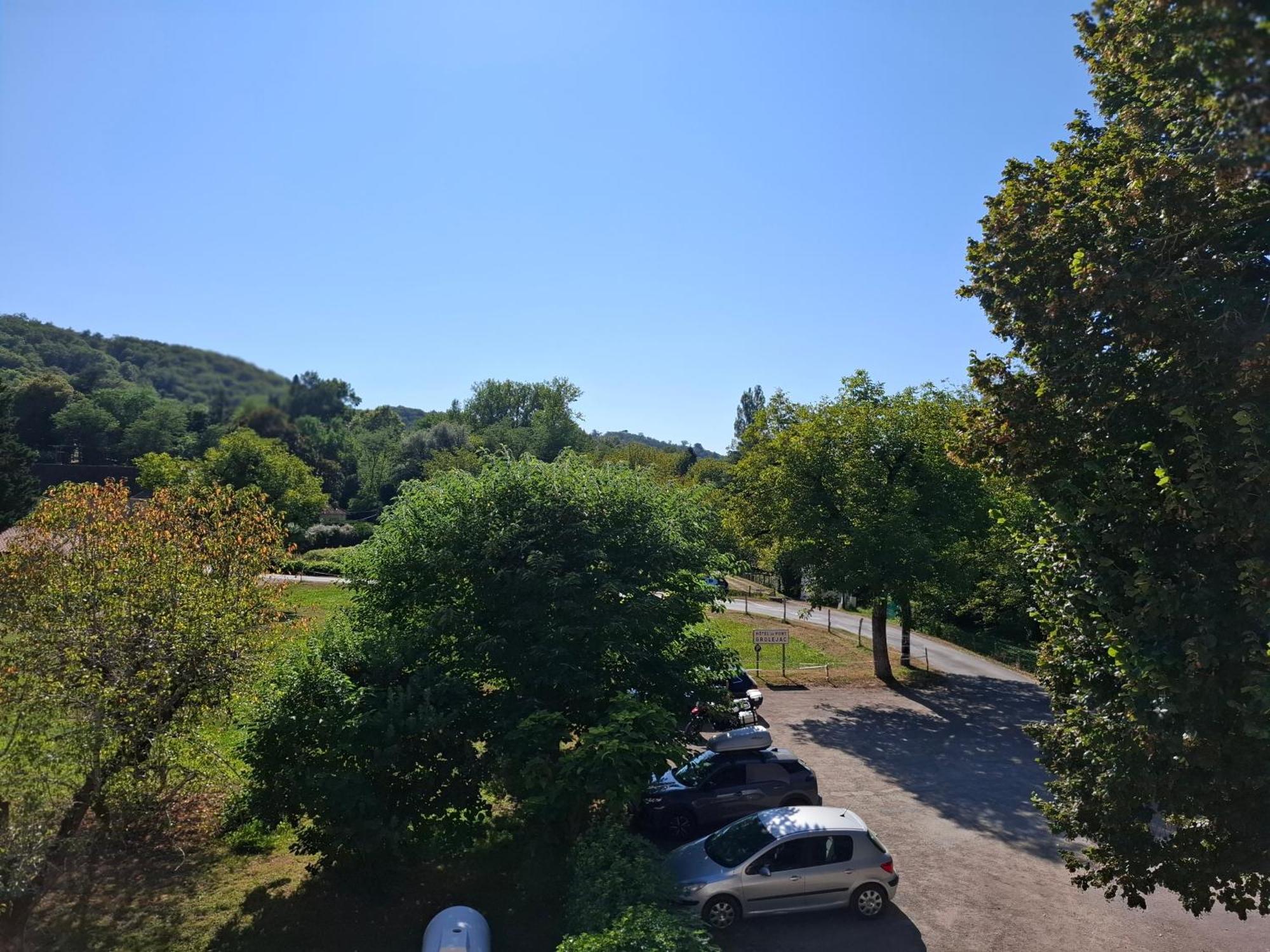Hotel Du Pont Et Restaurant A Grolejac Bagian luar foto
